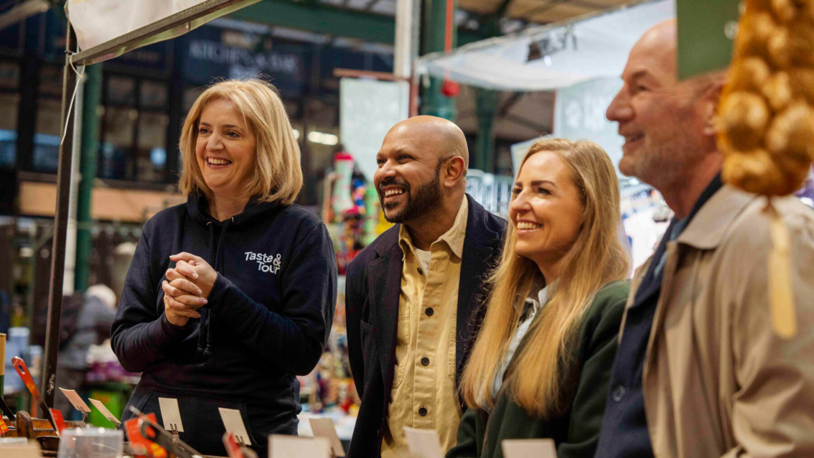 A group enjoy St Georges Market on the Taste and Tour experience